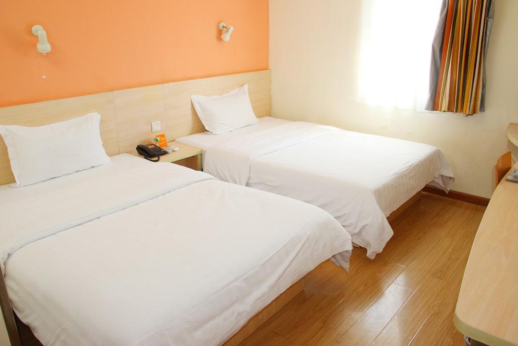 7Days Inn Qingdao Haiyunan Xinglong Road Rum bild